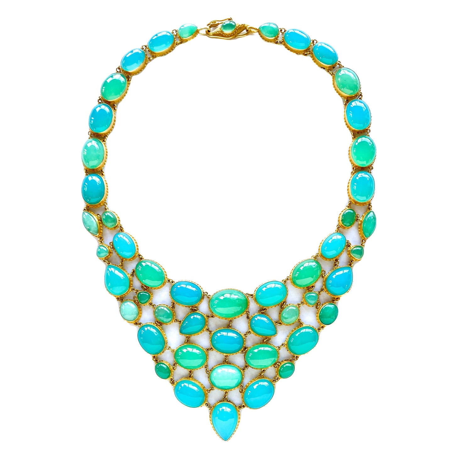 A bib-style necklace with a vibrant array of blue agate and green chrysoprase gemstones set in 22k gold, with a fluid mosaic design.