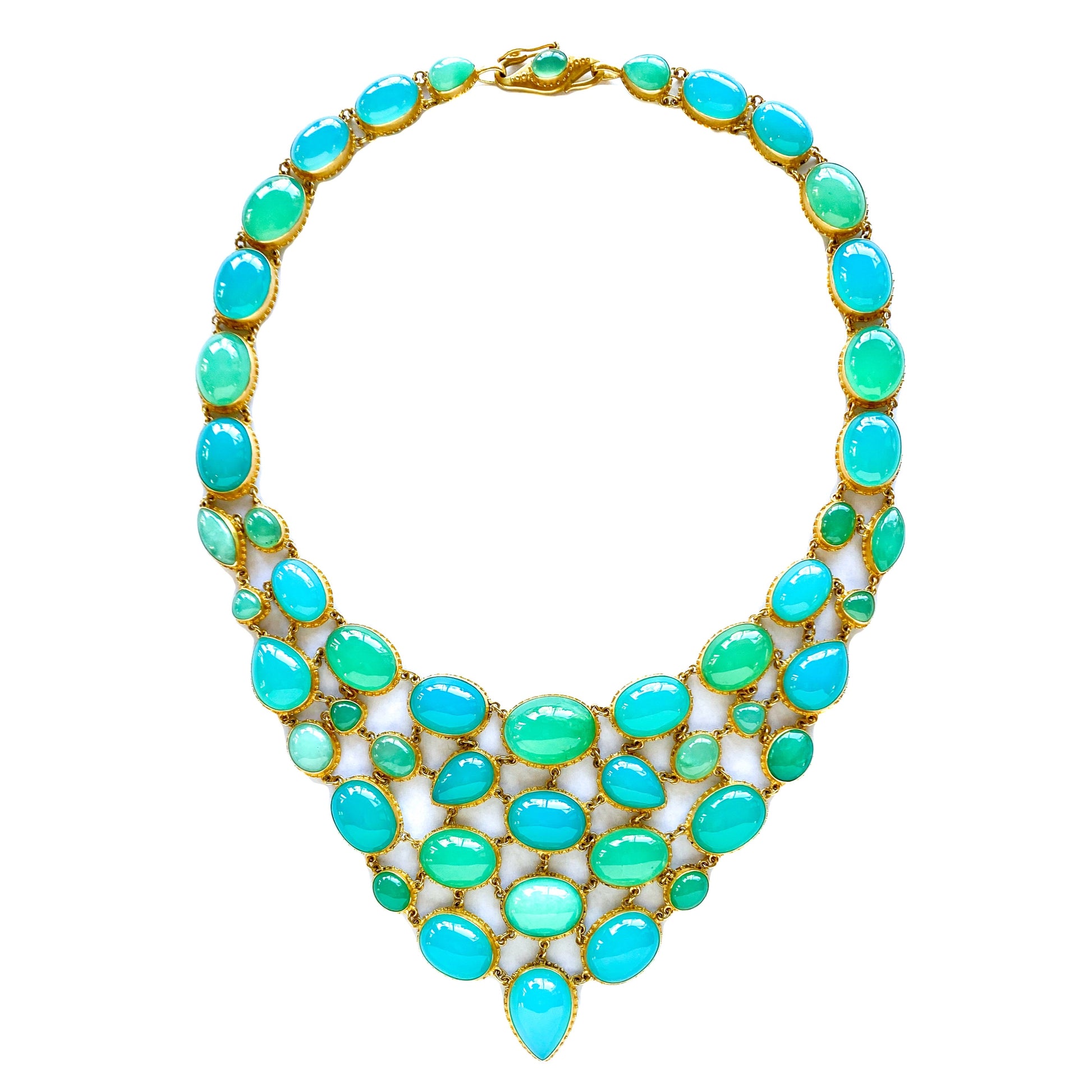 A bib-style necklace with a vibrant array of blue agate and green chrysoprase gemstones set in 22k gold, with a fluid mosaic design.