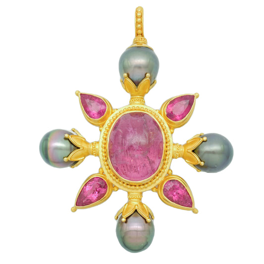 A luxurious gold pendant featuring a central rubellite tourmaline with surrounding peacock-hued Tahitian pearls, and additional pink gemstones, creating a vibrant contrast.